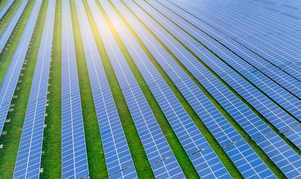 Solar farm under sunlight green energy panels