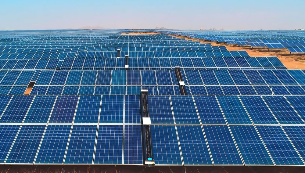 Large-scale solar farm under open sky showcasing off-grid solar solution